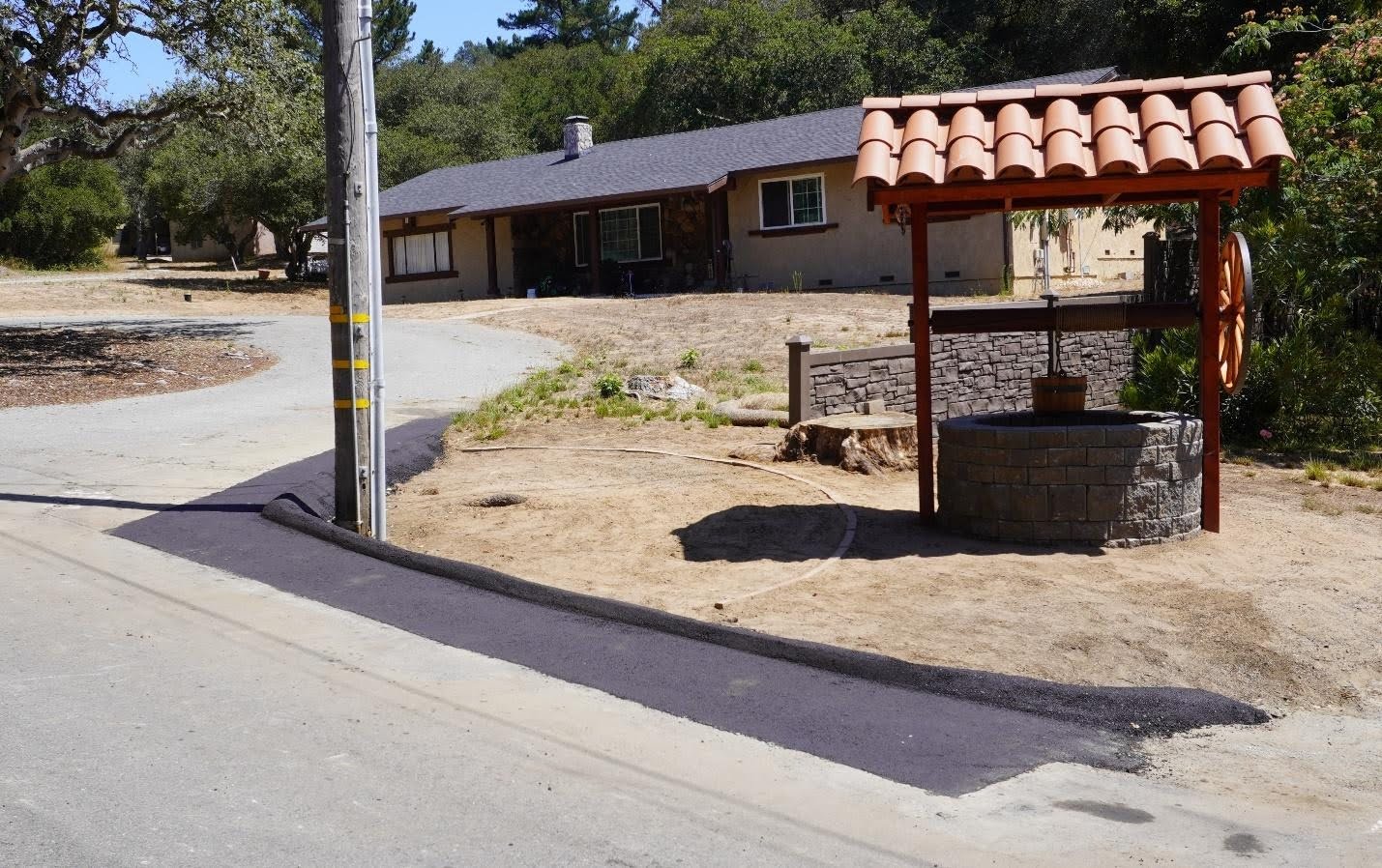 Berm done, street view. A work of art. Great job, guys.